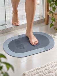 Wet feet stepping onto the quick-dry bath mat